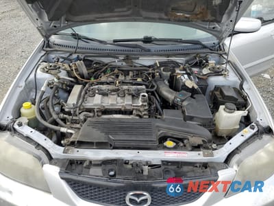 Zdjęcie 11 z 12 samochodu: 2003 MAZDA PROTEGE DX VIN:JM1BJ225530104806 - miniatura