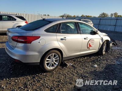 Trzecie zdjęcie samochodu z tyłu: 2017 FORD FOCUS SE VIN:1FADP3F20HL291848 - miniatura