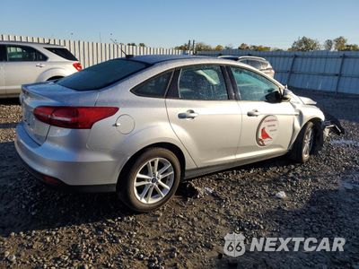 Trzecie zdjęcie samochodu z tyłu: 2017 FORD FOCUS SE VIN:1FADP3F20HL291848 - miniatura
