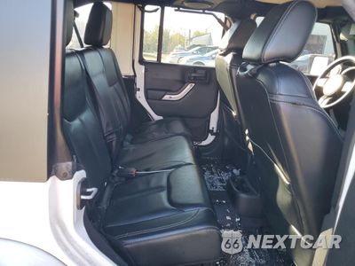 Zdjęcie 10 z 12 samochodu: 2013 JEEP WRANGLER UNLIMITED SAHARA VIN:1C4HJWEG6DL627248 - miniatura