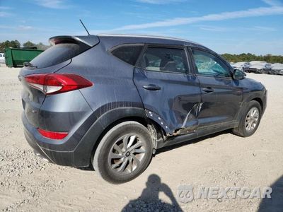Trzecie zdjęcie samochodu z tyłu: 2016 HYUNDAI TUCSON LIMITED VIN:KM8J33A29GU198136 - miniatura