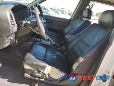 Zdjęcie 7 z 13 samochodu: 2003 NISSAN PATHFINDER LE VIN:JN8DR09X33W708515 - miniatura