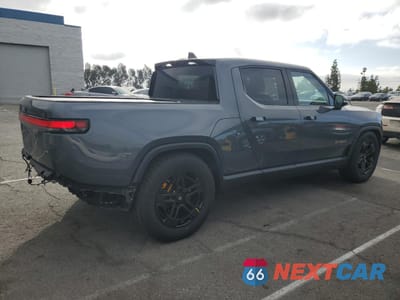 Trzecie zdjęcie samochodu z tyłu: 2023 RIVIAN R1T ADVENTURE VIN:7FCTGAAA4PN020541 - miniatura