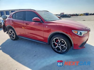 Czwarte zdjęcie samochodu z boku: 2022 ALFA ROMEO STELVIO TI VIN:ZASPAKBN9N7D28748 - miniatura