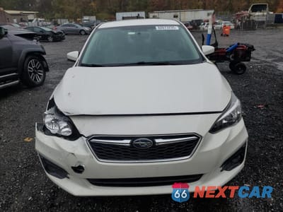 Piąte zdjęcie samochodu w środku: 2017 SUBARU IMPREZA PREMIUM PLUS VIN:4S3GKAD67H3616155 - miniatura