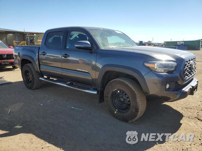 Czwarte zdjęcie samochodu z boku: 2020 TOYOTA TACOMA DOUBLE CAB VIN:3TMCZ5AN4LM324743 - miniatura