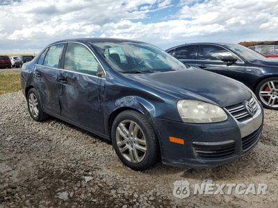 Czwarte zdjęcie samochodu z boku: 2009 VOLKSWAGEN JETTA TDI VIN:3VWRL71K49M097041 - miniatura