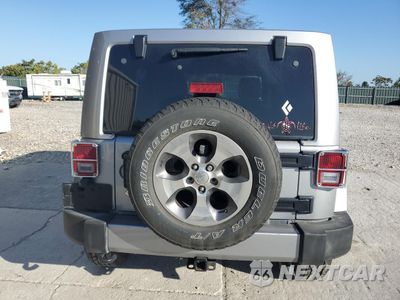 Zdjęcie 6 z 14 samochodu: 2016 JEEP WRANGLER UNLIMITED SAHARA VIN:1C4HJWEG2GL178624 - miniatura