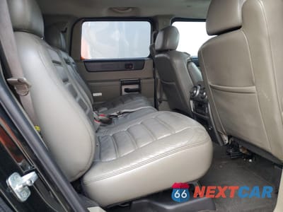 Zdjęcie 11 z 13 samochodu: 2003 HUMMER H2 VIN:5GRGN23U03H137888 - miniatura