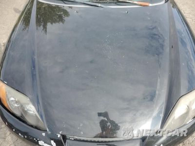 Zdjęcie 11 z 13 samochodu: 2003 HYUNDAI TIBURON VIN:KMHHN65F13U077098 - miniatura