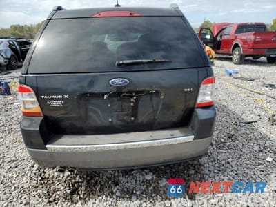 Zdjęcie 6 z 13 samochodu: 2009 FORD TAURUS X SEL VIN:1FMDK02W29GA03382 - miniatura