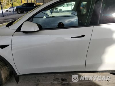 Zdjęcie 7 z 13 samochodu: 2022 TESLA MODEL Y VIN:7SAYGDEE6NF568078 - miniatura