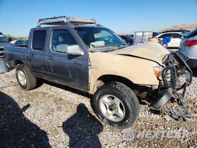 Czwarte zdjęcie samochodu z boku: 2000 NISSAN NAVARA FRONTIER XE VIN:1N6ED27Y8YC398535 - miniatura