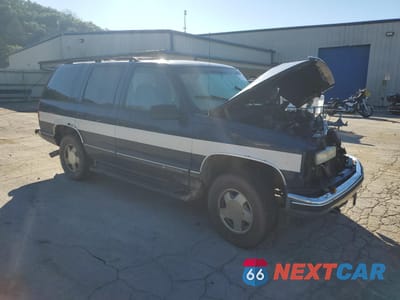 Czwarte zdjęcie samochodu z boku: 1999 CHEVROLET TAHOE K1500 VIN:1GNEK13R1XJ511163 - miniatura