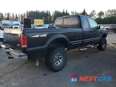 Trzecie zdjęcie samochodu z tyłu: 1999 FORD F250 SUPER DUTY VIN:1FTNX21F6XEA41262 - miniatura