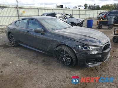 Czwarte zdjęcie samochodu z boku: 2024 BMW 840XI VIN:WBAGV4C01RCS01112 - miniatura