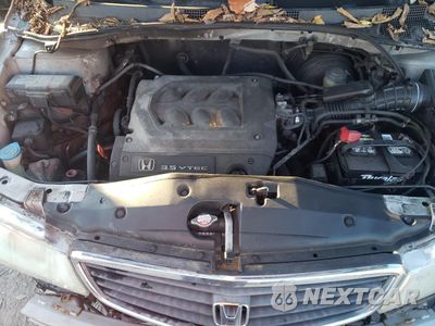 Zdjęcie 12 z 14 samochodu: 2001 HONDA ODYSSEY EX VIN:2HKRL18621H512604 - miniatura