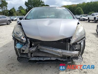Piąte zdjęcie samochodu w środku: 2010 HONDA FIT VIN:JHMGE8H28AS000725 - miniatura