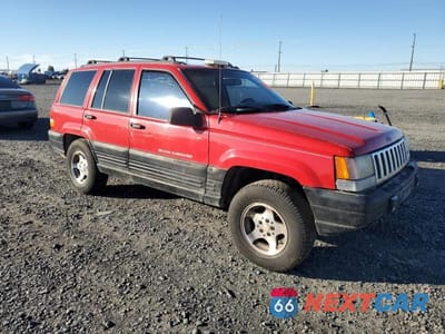 Czwarte zdjęcie samochodu z boku: 1998 JEEP GRAND CHEROKEE LAREDO VIN:1J4GZ58Y0WC280192 - miniatura