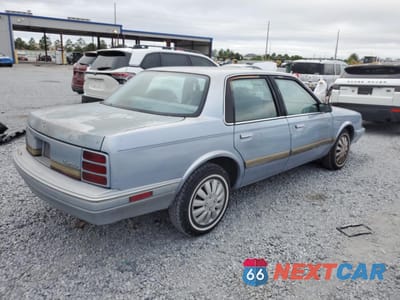 Trzecie zdjęcie samochodu z tyłu: 1994 OLDSMOBILE CUTLASS CIERA S VIN:1G3AG55M2R6400421 - miniatura