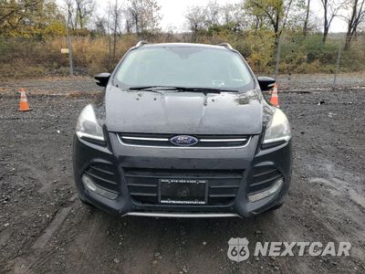 Piąte zdjęcie samochodu w środku: 2016 FORD ESCAPE TITANIUM VIN:1FMCU9J97GUA16553 - miniatura