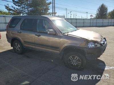 Czwarte zdjęcie samochodu z boku: 2002 HONDA CR-V EX VIN:JHLRD788X2C042999 - miniatura