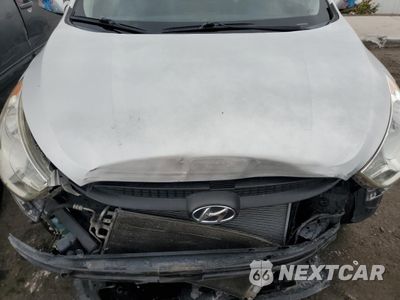 Zdjęcie 12 z 13 samochodu: 2011 HYUNDAI TUCSON GLS VIN:KM8JU3ACXBU128322 - miniatura