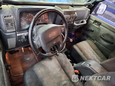Zdjęcie 8 z 12 samochodu: 2003 JEEP WRANGLER / TJ SPORT VIN:1J4FA49S43P343130 - miniatura