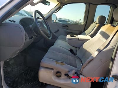 Zdjęcie 7 z 12 samochodu: 2003 FORD F150 VIN:1FTRX17203NB45949 - miniatura