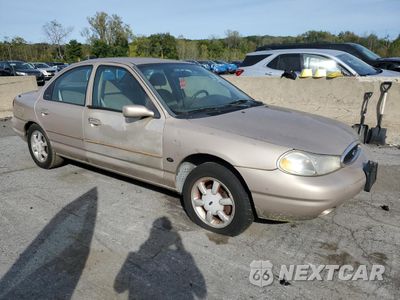 Czwarte zdjęcie samochodu z boku: 1999 FORD CONTOUR SE VIN:1FAFP6634XK189850 - miniatura