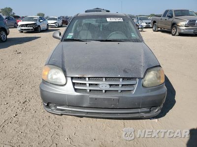 Piąte zdjęcie samochodu w środku: 2004 HYUNDAI ACCENT GL VIN:KMHCG45C64U499903 - miniatura