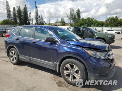 Czwarte zdjęcie samochodu z boku: 2017 HONDA CR-V LX VIN:7FARW5H31HE004786 - miniatura