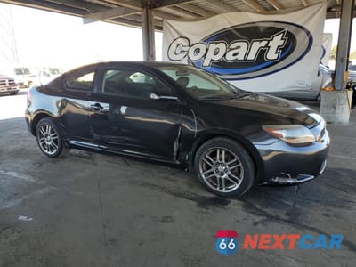 Czwarte zdjęcie samochodu z boku: 2006 TOYOTA SCION TC VIN:JTKDE167360115884 - miniatura