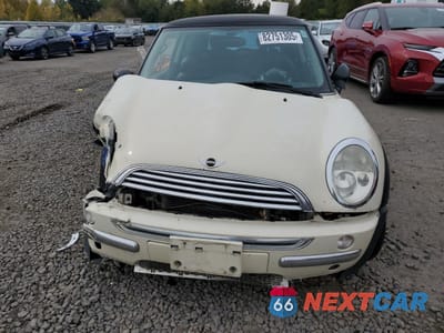 Zdjęcie 6 z 12 samochodu: 2003 MINI COOPER VIN:WMWRC33493TE15349 - miniatura