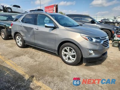 Czwarte zdjęcie samochodu z boku: 2019 CHEVROLET EQUINOX PREMIER VIN:3GNAXNEV9KS517849 - miniatura