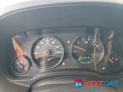 Zdjęcie 9 z 13 samochodu: 2010 JEEP COMPASS SPORT VIN:1J4NF4FB2AD510505 - miniatura