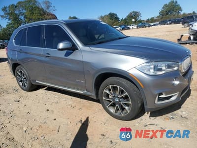 Czwarte zdjęcie samochodu z boku: 2017 BMW X5 XDR40E VIN:5UXKT0C51H0S80402 - miniatura