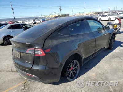 Trzecie zdjęcie samochodu z tyłu: 2024 TESLA Y VIN:7SAYGDEE2RF061958 - miniatura