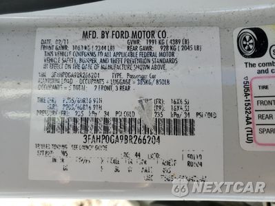 Zdjęcie 12 z 14 samochodu: 2011 FORD FUSION S VIN:3FAHP0GA9BR266204 - miniatura