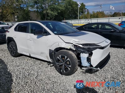 Czwarte zdjęcie samochodu z boku: 2023 TOYOTA BZ4X XLE VIN:JTMABACA3PA015184 - miniatura