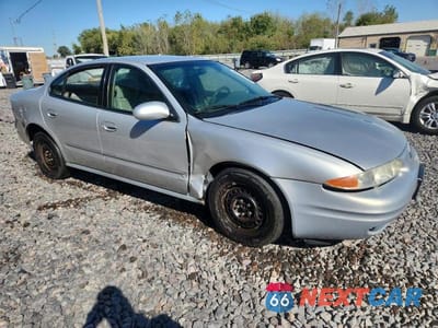 Czwarte zdjęcie samochodu z boku: 2001 OLDSMOBILE ALERO GL VIN:1G3NL52T21C123770 - miniatura