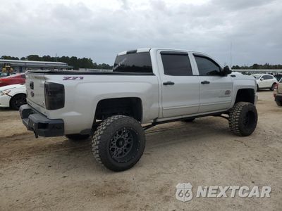 Trzecie zdjęcie samochodu z tyłu: 2017 CHEVROLET SILVERADO K1500 LT VIN:3GCUKREC4HG106199 - miniatura