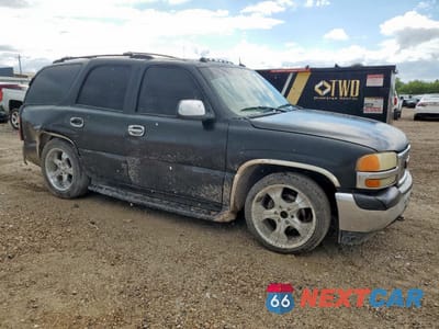 Czwarte zdjęcie samochodu z boku: 2004 GMC YUKON VIN:1GKEC13Z74R157320 - miniatura