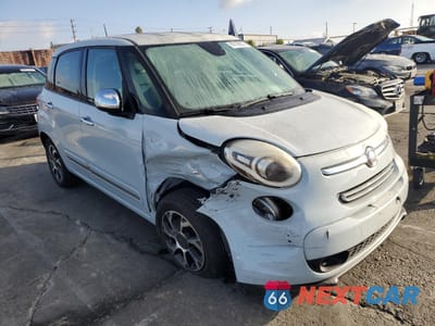 Czwarte zdjęcie samochodu z boku: 2015 FIAT 500L LOUNGE VIN:ZFBCFACHXFZ032206 - miniatura