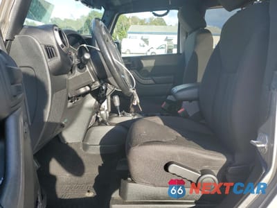Zdjęcie 7 z 15 samochodu: 2017 JEEP WRANGLER SPORT VIN:1C4AJWAG8HL520747 - miniatura