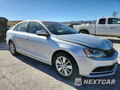 Czwarte zdjęcie samochodu z boku: 2016 VOLKSWAGEN JETTA SE VIN:3VWD67AJ0GM226785 - miniatura