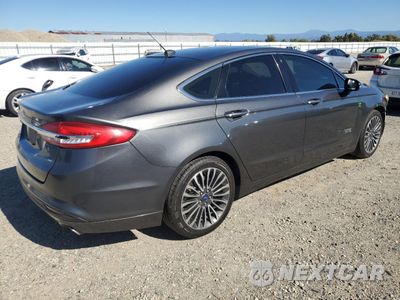 Trzecie zdjęcie samochodu z tyłu: 2017 FORD FUSION SE PHEV VIN:3FA6P0PU0HR306597 - miniatura