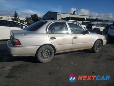Trzecie zdjęcie samochodu z tyłu: 1997 TOYOTA COROLLA BASE VIN:1NXBA02E5VZ658455 - miniatura