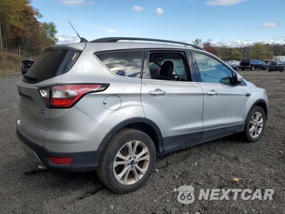 Trzecie zdjęcie samochodu z tyłu: 2018 FORD ESCAPE SE VIN:1FMCU9GD2JUC24956 - miniatura