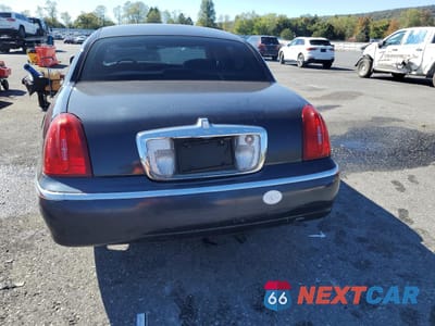 Zdjęcie 6 z 12 samochodu: 2000 LINCOLN TOWN CAR SIGNATURE VIN:1LNHM82W2YY815736 - miniatura